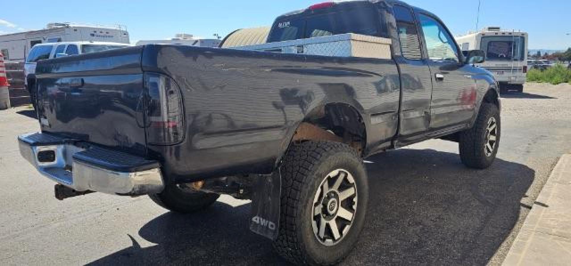 1999 BLACK /CLOTH Toyota TACOMA (4TAWM72N9X2) , Manual transmission, located at 1175 N Woodruff Ave, Idaho Falls, ID, 83401, 43.506901, -111.999657 - At Timberline Auto, finding a great deal on your next vehicle is always easy! Our experienced sales staff's goal is to help find you the right vehicle at the right price! Our knowledgeable finance department has options for almost any credit score. We offer extended service contract options to prote - Photo#9