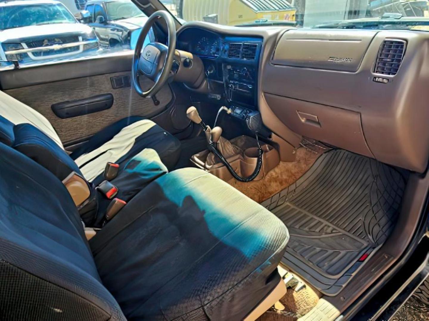 1999 BLACK /CLOTH Toyota TACOMA (4TAWM72N9X2) , Manual transmission, located at 1175 N Woodruff Ave, Idaho Falls, ID, 83401, 43.506901, -111.999657 - At Timberline Auto, finding a great deal on your next vehicle is always easy! Our experienced sales staff's goal is to help find you the right vehicle at the right price! Our knowledgeable finance department has options for almost any credit score. We offer extended service contract options to prote - Photo#5