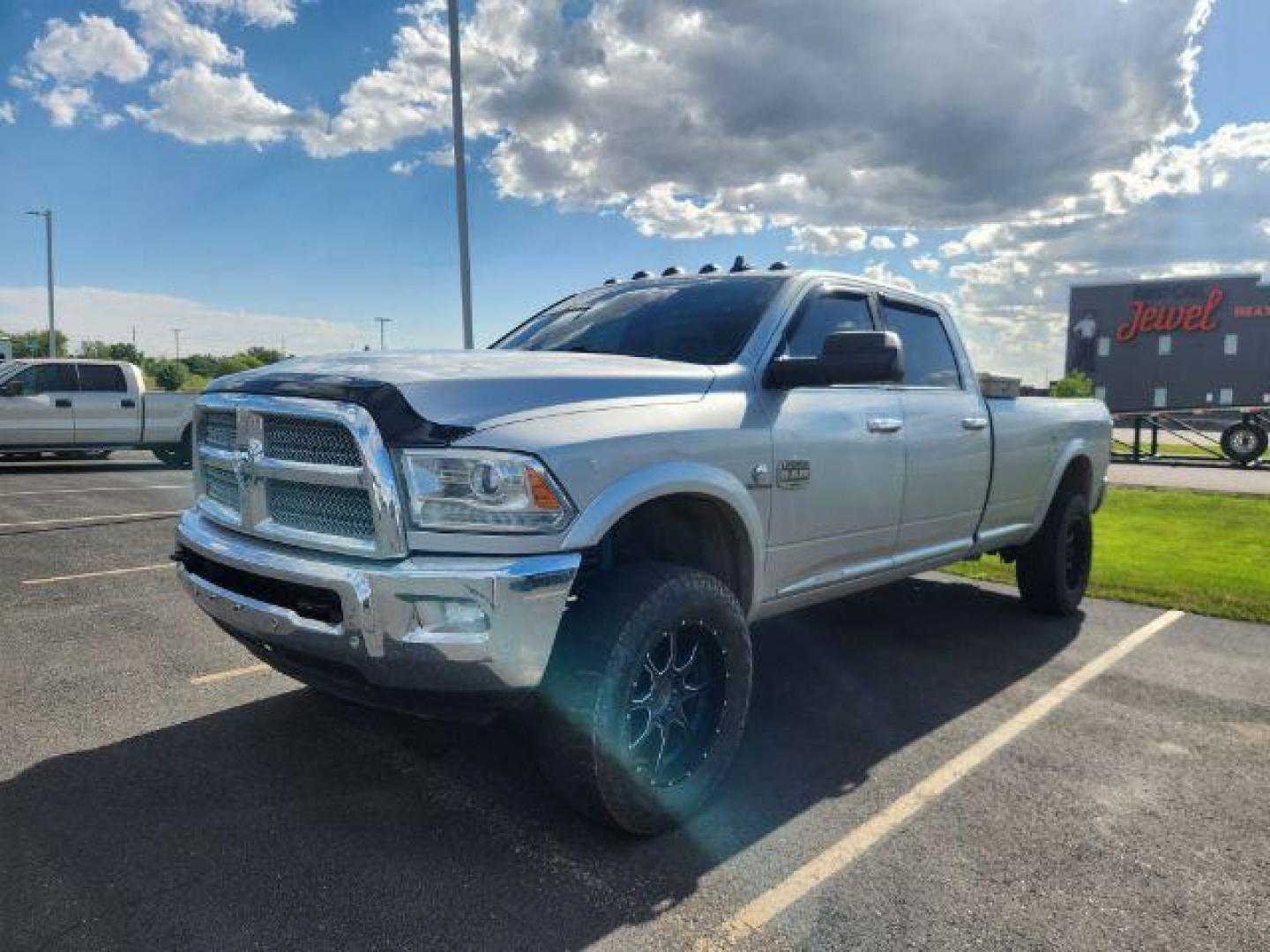 2017 Bright Silver Metallic Clearcoat /Cattle Tan/Black Ram 2500 (3C6UR5LL4HG) with an Cummins 67L I-6 diesel direct injection engine, Automatic transmission, located at 1175 N Woodruff Ave, Idaho Falls, ID, 83401, 43.506901, -111.999657 - At Timberline Auto, finding a great deal on your next vehicle is always easy! Our experienced sales staff's goal is to help find you the right vehicle at the right price! Our knowledgeable finance department has options for almost any credit score. We offer extended service contract options to prote - Photo#1