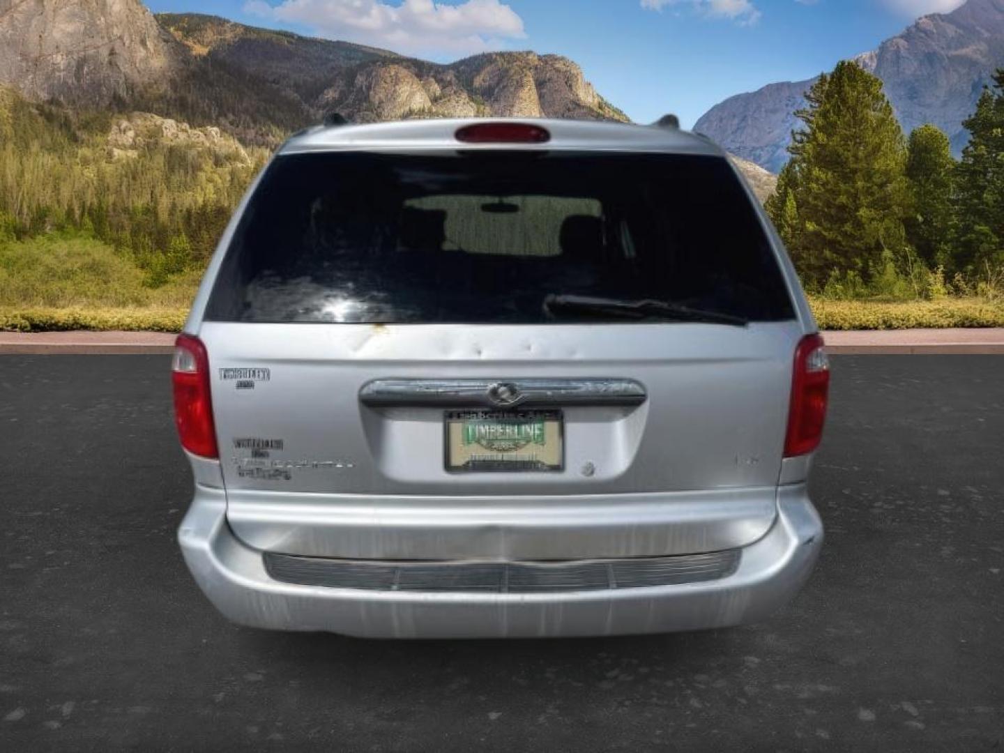 2005 Bright Silver Metallic Clearcoat /Medium Slate Gray Chrysler Town Country (2C4GP44R45R) with an 33L V-6 regular unleaded engine, Automatic transmission, located at 1175 N Woodruff Ave, Idaho Falls, ID, 83401, 43.506901, -111.999657 - At Timberline Auto, finding a great deal on your next vehicle is always easy! Our experienced sales staff's goal is to help find you the right vehicle at the right price! Our knowledgeable finance department has options for almost any credit score. We offer extended service contract options to prote - Photo#3