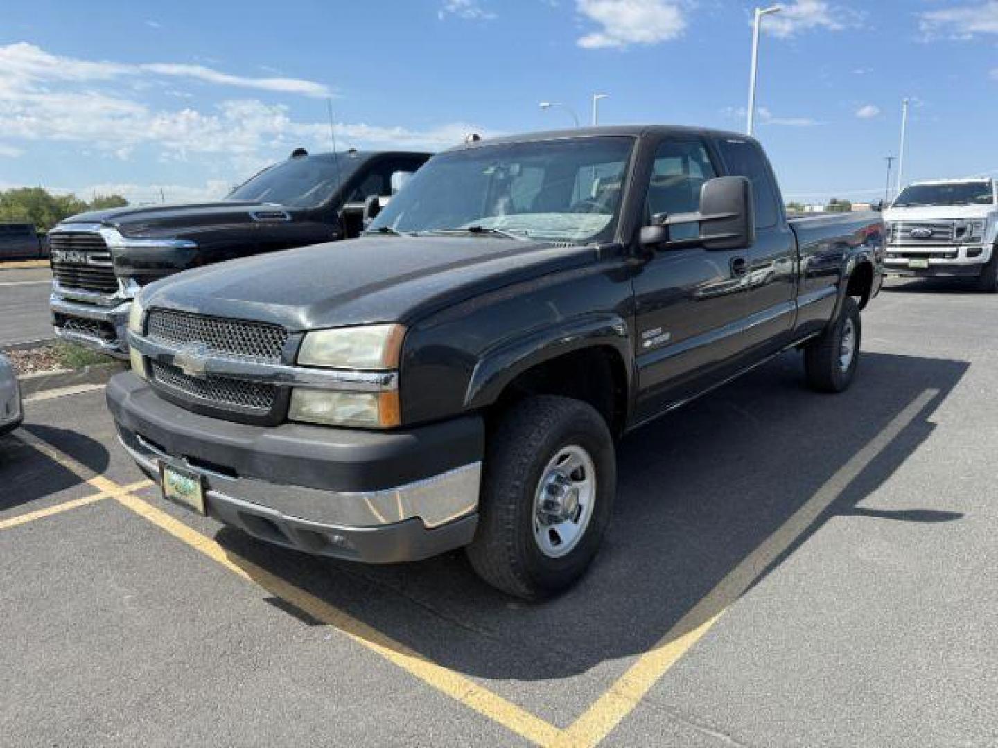 2004 GRAY /Dark Charcoal Chevrolet Silverado 3500 (1GCHK39234E) with an 66 engine, Automatic transmission, located at 1175 N Woodruff Ave, Idaho Falls, ID, 83401, 43.506901, -111.999657 - At Timberline Auto, finding a great deal on your next vehicle is always easy! Our experienced sales staff's goal is to help find you the right vehicle at the right price! Our knowledgeable finance department has options for almost any credit score. We offer extended service contract options to prote - Photo#1