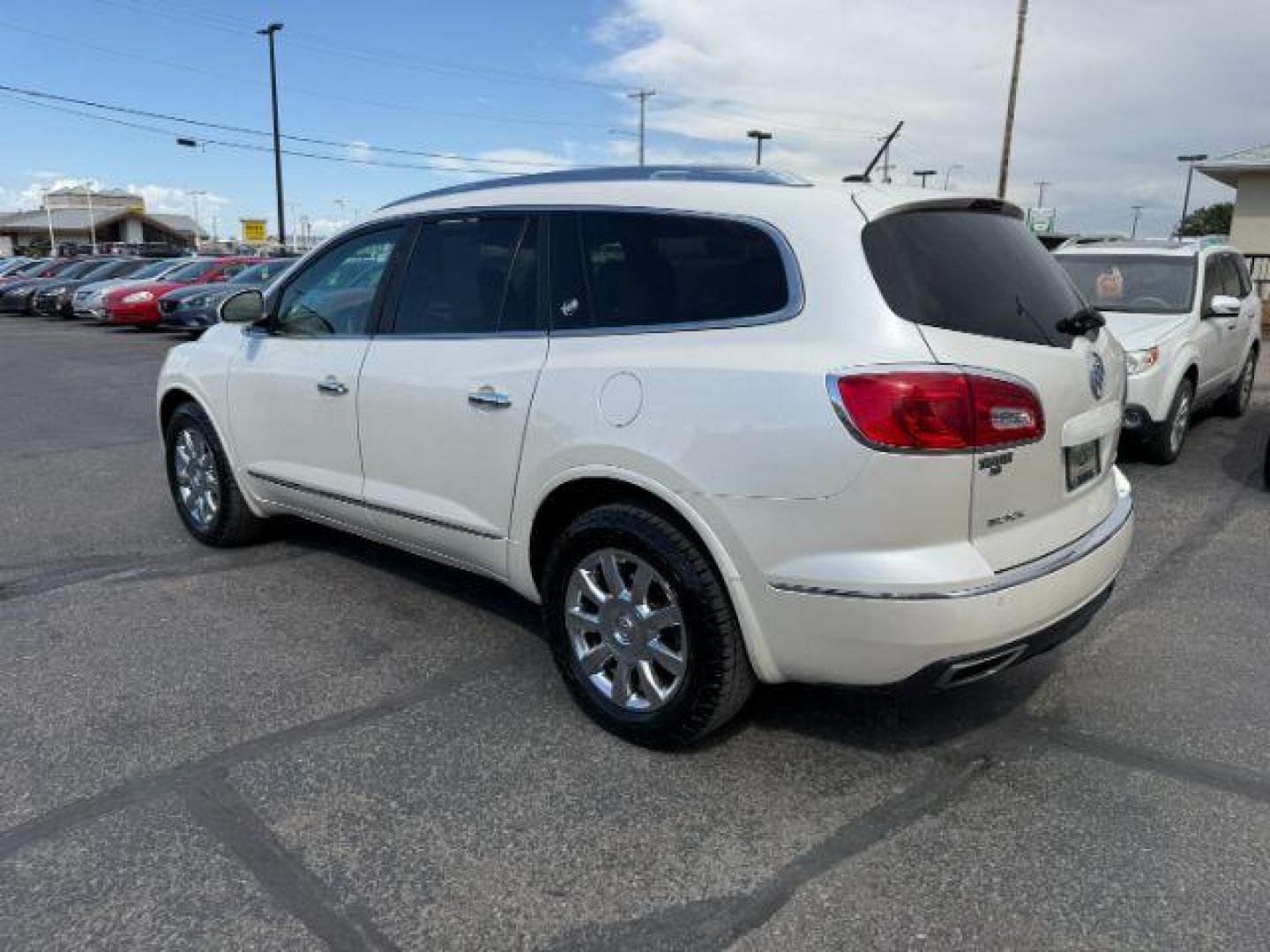 2014 White Opal /Titanium Buick Enclave (5GAKVCKD9EJ) with an 36L V-6 gasoline direct injection engine, Automatic transmission, located at 1175 N Woodruff Ave, Idaho Falls, ID, 83401, 43.506901, -111.999657 - At Timberline Auto, finding a great deal on your next vehicle is always easy! Our experienced sales staff's goal is to help find you the right vehicle at the right price! Our knowledgeable finance department has options for almost any credit score. We offer extended service contract options to prote - Photo#2