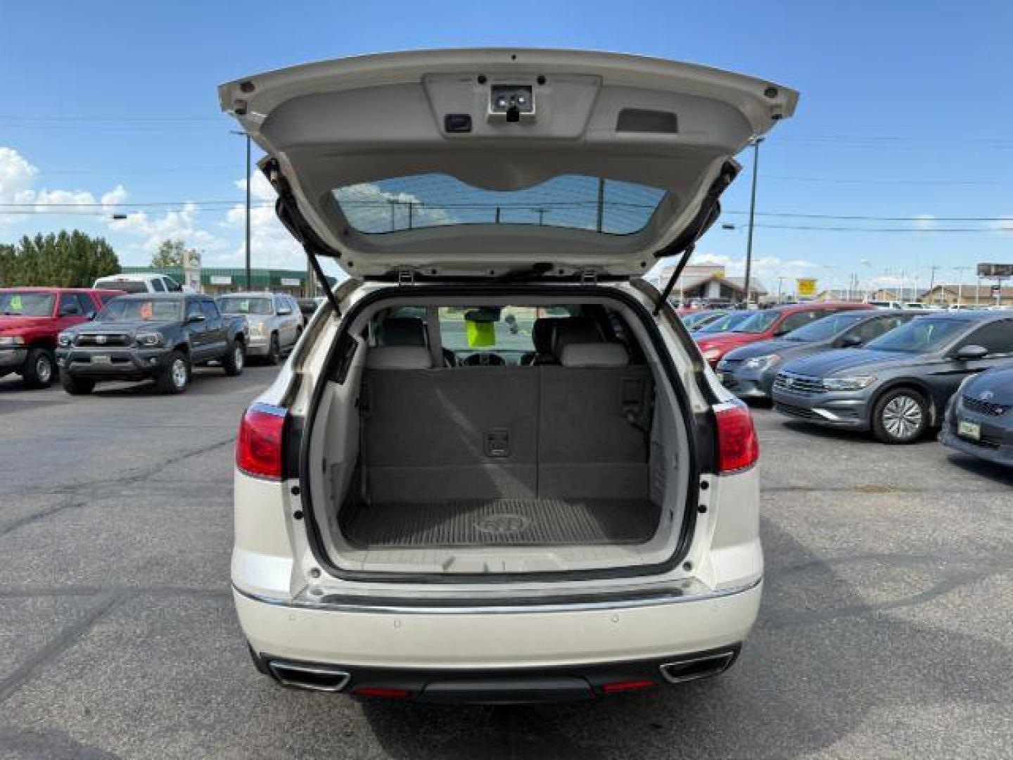 2014 White Opal /Titanium Buick Enclave (5GAKVCKD9EJ) with an 36L V-6 gasoline direct injection engine, Automatic transmission, located at 1175 N Woodruff Ave, Idaho Falls, ID, 83401, 43.506901, -111.999657 - At Timberline Auto, finding a great deal on your next vehicle is always easy! Our experienced sales staff's goal is to help find you the right vehicle at the right price! Our knowledgeable finance department has options for almost any credit score. We offer extended service contract options to prote - Photo#4