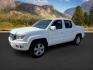 2011 Taffeta White /Black Honda Ridgeline (5FPYK1F5XBB) with an 35L V-6 variable valve control engine, Automatic transmission, located at 1175 N Woodruff Ave, Idaho Falls, ID, 83401, 43.506901, -111.999657 - At Timberline Auto, finding a great deal on your next vehicle is always easy! Our experienced sales staff's goal is to help find you the right vehicle at the right price! Our knowledgeable finance department has options for almost any credit score. We offer extended service contract options to prote - Photo#0