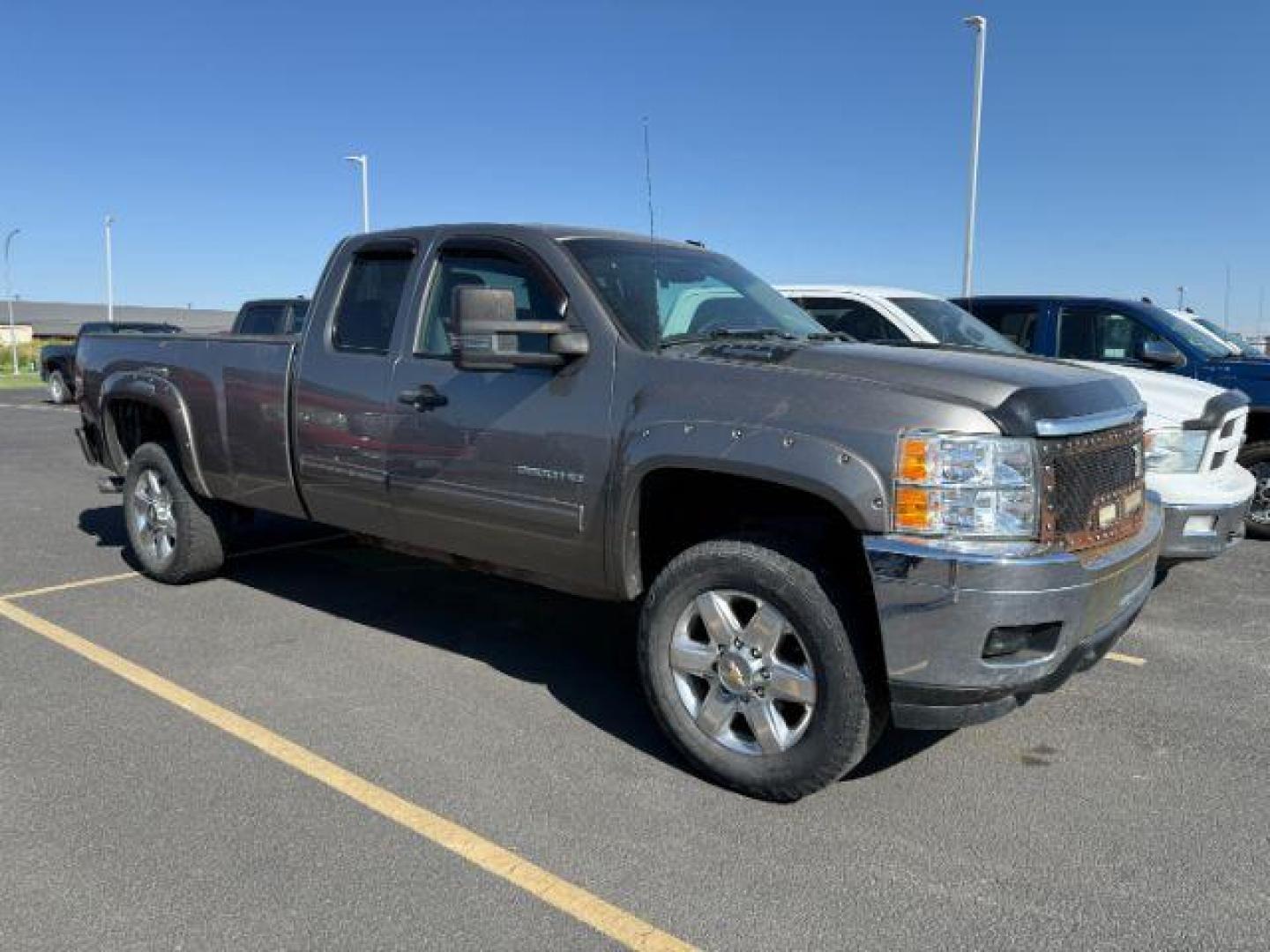 2013 Graystone Metallic /Ebony Chevrolet Silverado 2500HD (1GC2KXCG2DZ) with an Vortec 6L V-8 variable valve control engine, Automatic transmission, located at 1175 N Woodruff Ave, Idaho Falls, ID, 83401, 43.506901, -111.999657 - At Timberline Auto, finding a great deal on your next vehicle is always easy! Our experienced sales staff's goal is to help find you the right vehicle at the right price! Our knowledgeable finance department has options for almost any credit score. We offer extended service contract options to prote - Photo#0