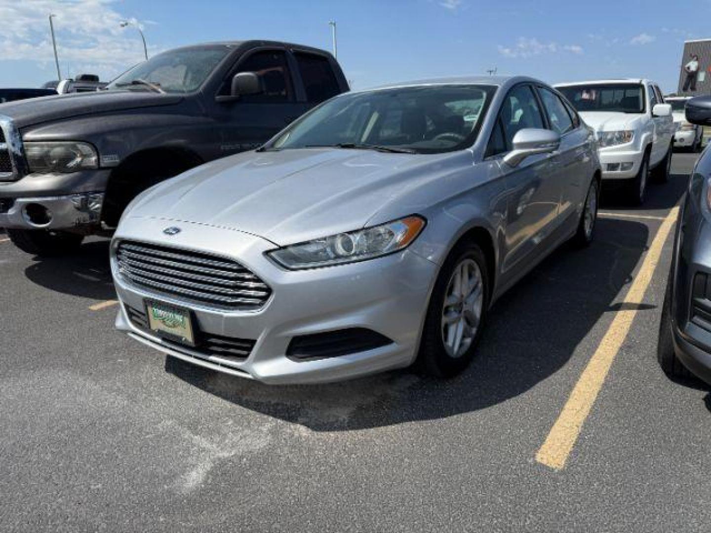 2014 SILVER /Ebony Ford Fusion (3FA6P0H72ER) with an Duratec 25L I-4 DOHC engine, Automatic transmission, located at 1175 N Woodruff Ave, Idaho Falls, ID, 83401, 43.506901, -111.999657 - At Timberline Auto, finding a great deal on your next vehicle is always easy! Our experienced sales staff's goal is to help find you the right vehicle at the right price! Our knowledgeable finance department has options for almost any credit score. We offer extended service contract options to prote - Photo#1
