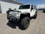 2010 WHITE /Dark Slate Gray/Med Slate Gray Jeep Wrangler Unlimited (1J4BA6H12AL) with an 38L V-6 regular unleaded engine, Automatic transmission, located at 1175 N Woodruff Ave, Idaho Falls, ID, 83401, 43.506901, -111.999657 - At Timberline Auto, finding a great deal on your next vehicle is always easy! Our experienced sales staff's goal is to help find you the right vehicle at the right price! Our knowledgeable finance department has options for almost any credit score. We offer extended service contract options to prote - Photo#1
