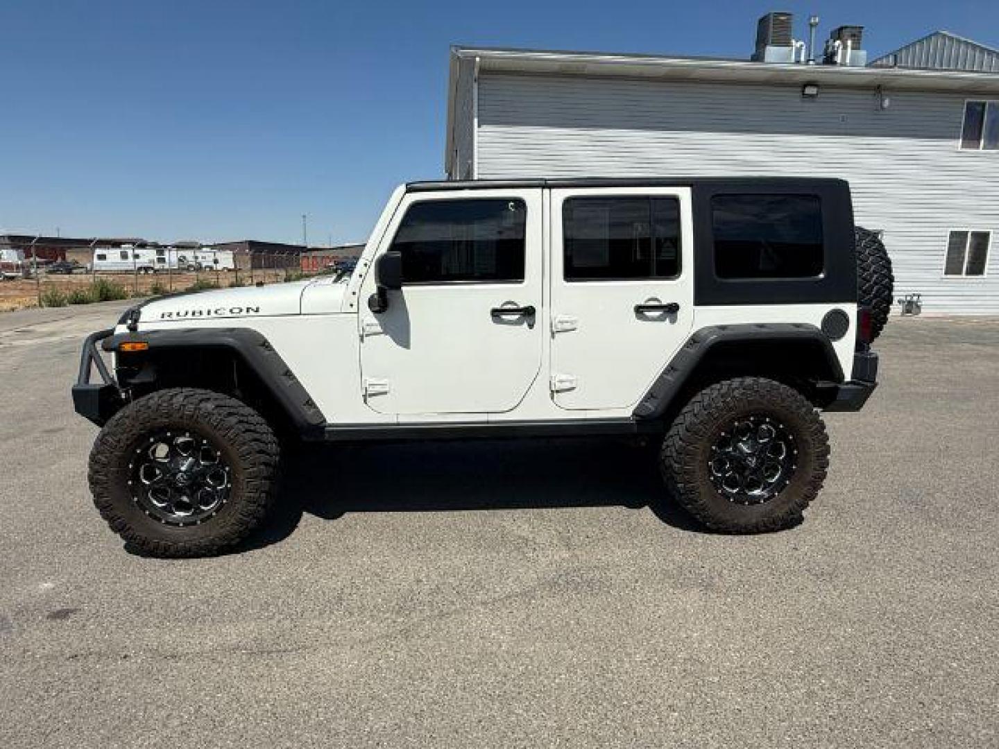 2010 WHITE /Dark Slate Gray/Med Slate Gray Jeep Wrangler Unlimited (1J4BA6H12AL) with an 38L V-6 regular unleaded engine, Automatic transmission, located at 1175 N Woodruff Ave, Idaho Falls, ID, 83401, 43.506901, -111.999657 - At Timberline Auto, finding a great deal on your next vehicle is always easy! Our experienced sales staff's goal is to help find you the right vehicle at the right price! Our knowledgeable finance department has options for almost any credit score. We offer extended service contract options to prote - Photo#2