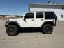 2010 WHITE /Dark Slate Gray/Med Slate Gray Jeep Wrangler Unlimited (1J4BA6H12AL) with an 38L V-6 regular unleaded engine, Automatic transmission, located at 1175 N Woodruff Ave, Idaho Falls, ID, 83401, 43.506901, -111.999657 - At Timberline Auto, finding a great deal on your next vehicle is always easy! Our experienced sales staff's goal is to help find you the right vehicle at the right price! Our knowledgeable finance department has options for almost any credit score. We offer extended service contract options to prote - Photo#2