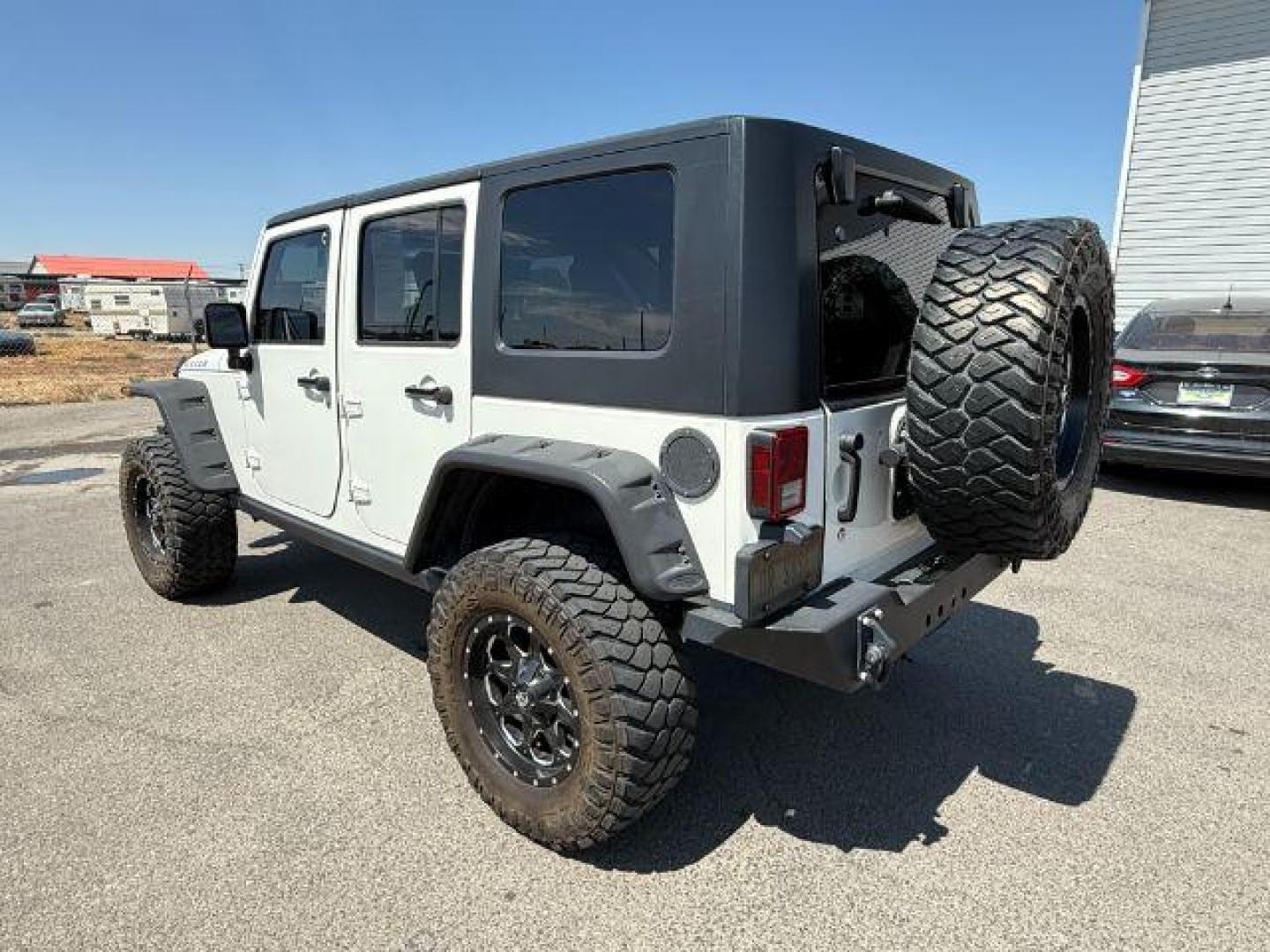 2010 WHITE /Dark Slate Gray/Med Slate Gray Jeep Wrangler Unlimited (1J4BA6H12AL) with an 38L V-6 regular unleaded engine, Automatic transmission, located at 1175 N Woodruff Ave, Idaho Falls, ID, 83401, 43.506901, -111.999657 - At Timberline Auto, finding a great deal on your next vehicle is always easy! Our experienced sales staff's goal is to help find you the right vehicle at the right price! Our knowledgeable finance department has options for almost any credit score. We offer extended service contract options to prote - Photo#3