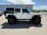 2010 WHITE /Dark Slate Gray/Med Slate Gray Jeep Wrangler Unlimited (1J4BA6H12AL) with an 38L V-6 regular unleaded engine, Automatic transmission, located at 1175 N Woodruff Ave, Idaho Falls, ID, 83401, 43.506901, -111.999657 - At Timberline Auto, finding a great deal on your next vehicle is always easy! Our experienced sales staff's goal is to help find you the right vehicle at the right price! Our knowledgeable finance department has options for almost any credit score. We offer extended service contract options to prote - Photo#7