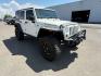 2010 WHITE /Dark Slate Gray/Med Slate Gray Jeep Wrangler Unlimited (1J4BA6H12AL) with an 38L V-6 regular unleaded engine, Automatic transmission, located at 1175 N Woodruff Ave, Idaho Falls, ID, 83401, 43.506901, -111.999657 - At Timberline Auto, finding a great deal on your next vehicle is always easy! Our experienced sales staff's goal is to help find you the right vehicle at the right price! Our knowledgeable finance department has options for almost any credit score. We offer extended service contract options to prote - Photo#8