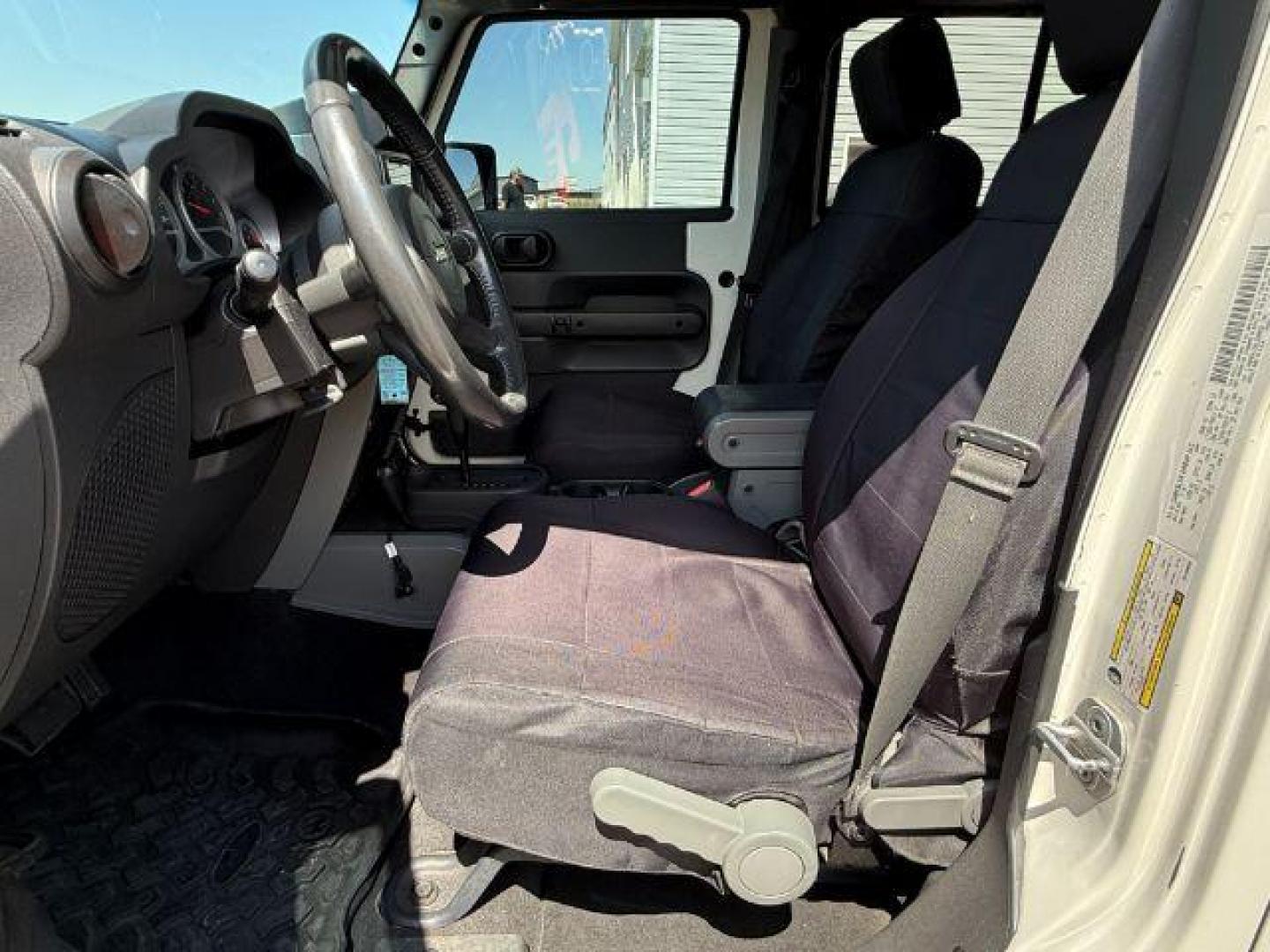 2010 WHITE /Dark Slate Gray/Med Slate Gray Jeep Wrangler Unlimited (1J4BA6H12AL) with an 38L V-6 regular unleaded engine, Automatic transmission, located at 1175 N Woodruff Ave, Idaho Falls, ID, 83401, 43.506901, -111.999657 - At Timberline Auto, finding a great deal on your next vehicle is always easy! Our experienced sales staff's goal is to help find you the right vehicle at the right price! Our knowledgeable finance department has options for almost any credit score. We offer extended service contract options to prote - Photo#12
