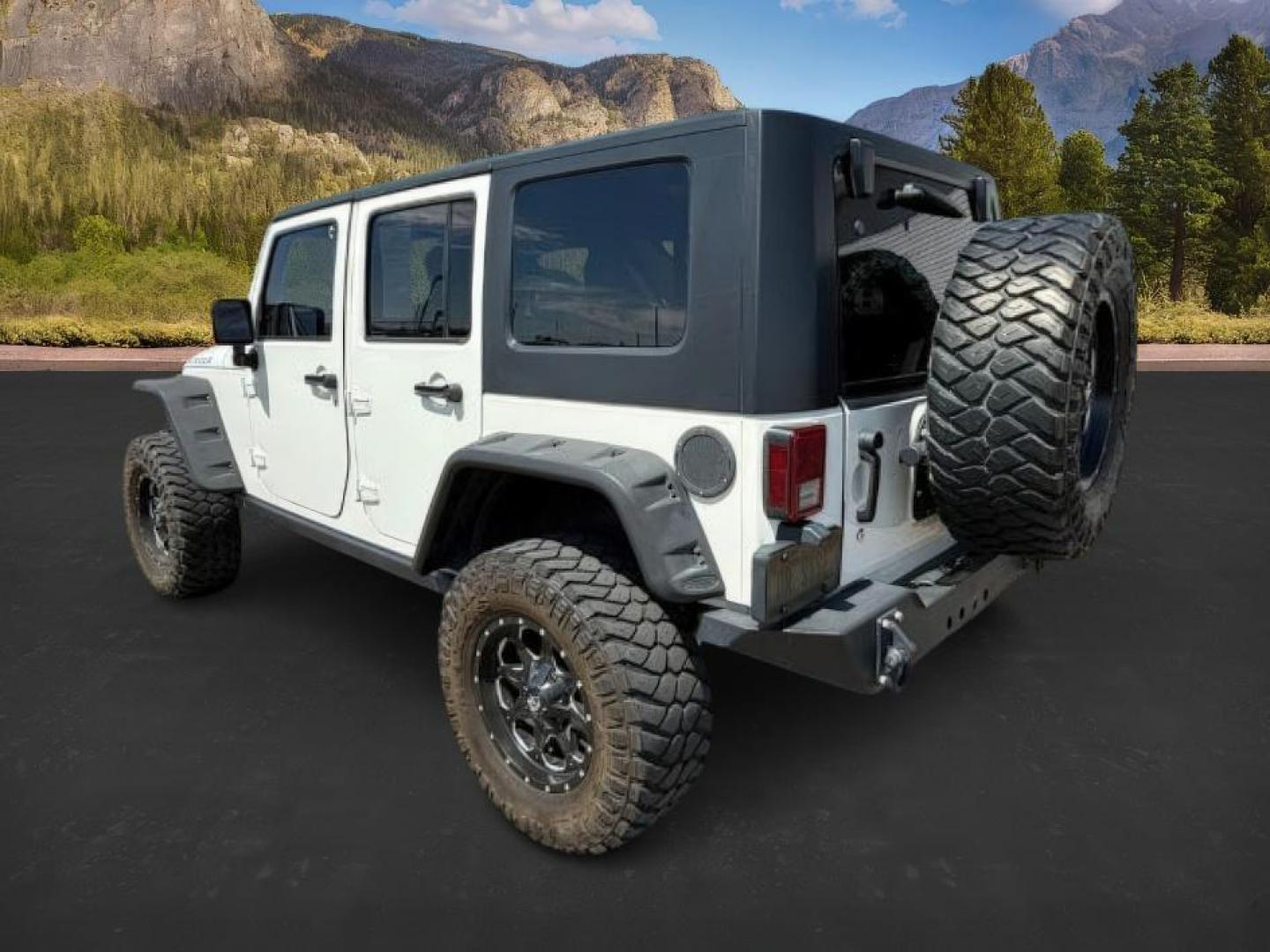 2010 WHITE /Dark Slate Gray/Med Slate Gray Jeep Wrangler Unlimited (1J4BA6H12AL) with an 38L V-6 regular unleaded engine, Automatic transmission, located at 1175 N Woodruff Ave, Idaho Falls, ID, 83401, 43.506901, -111.999657 - At Timberline Auto, finding a great deal on your next vehicle is always easy! Our experienced sales staff's goal is to help find you the right vehicle at the right price! Our knowledgeable finance department has options for almost any credit score. We offer extended service contract options to prote - Photo#2
