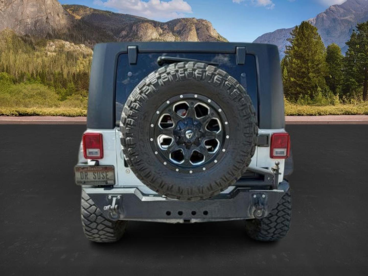 2010 WHITE /Dark Slate Gray/Med Slate Gray Jeep Wrangler Unlimited (1J4BA6H12AL) with an 38L V-6 regular unleaded engine, Automatic transmission, located at 1175 N Woodruff Ave, Idaho Falls, ID, 83401, 43.506901, -111.999657 - At Timberline Auto, finding a great deal on your next vehicle is always easy! Our experienced sales staff's goal is to help find you the right vehicle at the right price! Our knowledgeable finance department has options for almost any credit score. We offer extended service contract options to prote - Photo#3