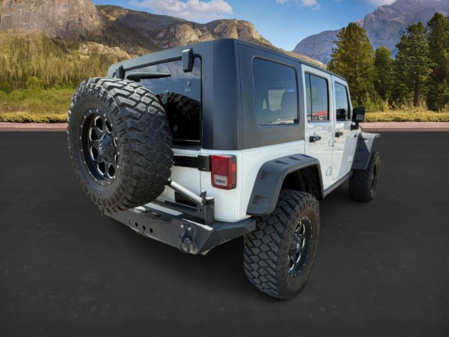 2010 WHITE /Dark Slate Gray/Med Slate Gray Jeep Wrangler Unlimited (1J4BA6H12AL) with an 38L V-6 regular unleaded engine, Automatic transmission, located at 1175 N Woodruff Ave, Idaho Falls, ID, 83401, 43.506901, -111.999657 - At Timberline Auto, finding a great deal on your next vehicle is always easy! Our experienced sales staff's goal is to help find you the right vehicle at the right price! Our knowledgeable finance department has options for almost any credit score. We offer extended service contract options to prote - Photo#5