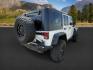 2010 WHITE /Dark Slate Gray/Med Slate Gray Jeep Wrangler Unlimited (1J4BA6H12AL) with an 38L V-6 regular unleaded engine, Automatic transmission, located at 1175 N Woodruff Ave, Idaho Falls, ID, 83401, 43.506901, -111.999657 - At Timberline Auto, finding a great deal on your next vehicle is always easy! Our experienced sales staff's goal is to help find you the right vehicle at the right price! Our knowledgeable finance department has options for almost any credit score. We offer extended service contract options to prote - Photo#5