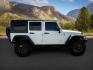 2010 WHITE /Dark Slate Gray/Med Slate Gray Jeep Wrangler Unlimited (1J4BA6H12AL) with an 38L V-6 regular unleaded engine, Automatic transmission, located at 1175 N Woodruff Ave, Idaho Falls, ID, 83401, 43.506901, -111.999657 - At Timberline Auto, finding a great deal on your next vehicle is always easy! Our experienced sales staff's goal is to help find you the right vehicle at the right price! Our knowledgeable finance department has options for almost any credit score. We offer extended service contract options to prote - Photo#6