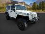 2010 WHITE /Dark Slate Gray/Med Slate Gray Jeep Wrangler Unlimited (1J4BA6H12AL) with an 38L V-6 regular unleaded engine, Automatic transmission, located at 1175 N Woodruff Ave, Idaho Falls, ID, 83401, 43.506901, -111.999657 - At Timberline Auto, finding a great deal on your next vehicle is always easy! Our experienced sales staff's goal is to help find you the right vehicle at the right price! Our knowledgeable finance department has options for almost any credit score. We offer extended service contract options to prote - Photo#7