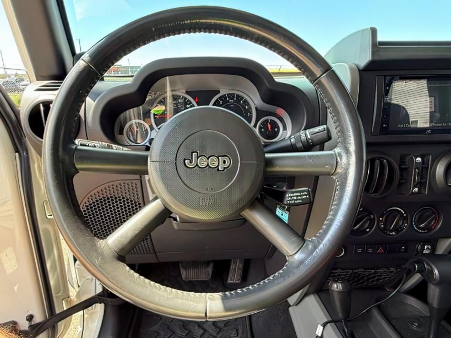 2010 WHITE /Dark Slate Gray/Med Slate Gray Jeep Wrangler Unlimited (1J4BA6H12AL) with an 38L V-6 regular unleaded engine, Automatic transmission, located at 1175 N Woodruff Ave, Idaho Falls, ID, 83401, 43.506901, -111.999657 - At Timberline Auto, finding a great deal on your next vehicle is always easy! Our experienced sales staff's goal is to help find you the right vehicle at the right price! Our knowledgeable finance department has options for almost any credit score. We offer extended service contract options to prote - Photo#13