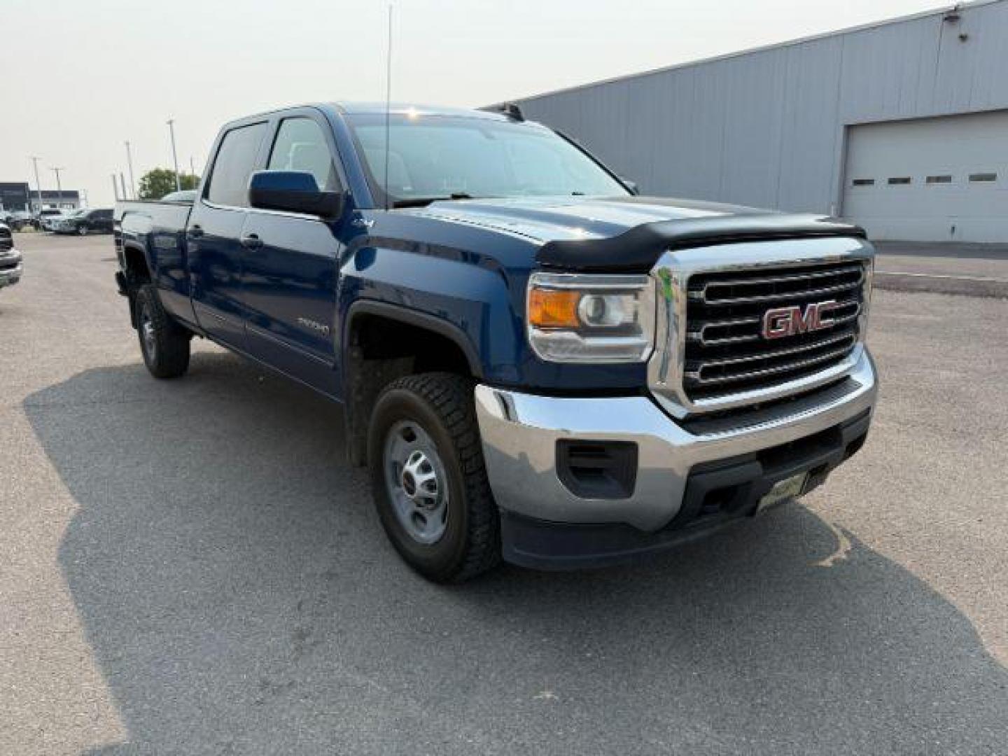 2018 BLUE /Jet Black GMC Sierra 2500HD (1GT12SEG9JF) with an Vortec 6L V-8 variable valve control engine, Automatic transmission, located at 1175 N Woodruff Ave, Idaho Falls, ID, 83401, 43.506901, -111.999657 - At Timberline Auto, finding a great deal on your next vehicle is always easy! Our experienced sales staff's goal is to help find you the right vehicle at the right price! Our knowledgeable finance department has options for almost any credit score. We offer extended service contract options to prote - Photo#26