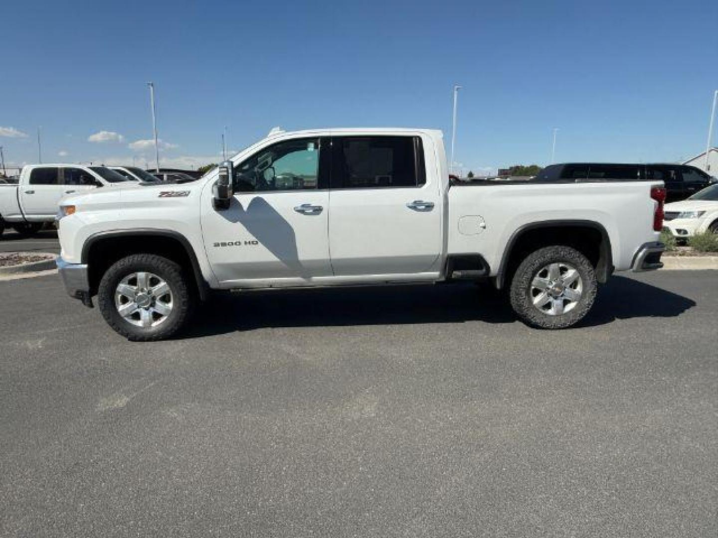 2021 Summit White /Jet Black Chevrolet Silverado 3500HD (1GC4YUEY4MF) with an Duramax 66L V-8 diesel direct injection engine, Automatic transmission, located at 1175 N Woodruff Ave, Idaho Falls, ID, 83401, 43.506901, -111.999657 - At Timberline Auto, finding a great deal on your next vehicle is always easy! Our experienced sales staff's goal is to help find you the right vehicle at the right price! Our knowledgeable finance department has options for almost any credit score. We offer extended service contract options to prote - Photo#1