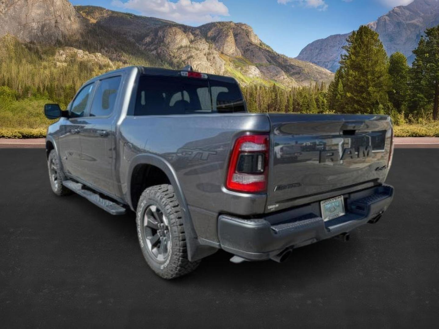 2022 GRAY /LEATHER Ram 1500 (1C6SRFLT3NN) with an 57 engine, Automatic transmission, located at 1175 N Woodruff Ave, Idaho Falls, ID, 83401, 43.506901, -111.999657 - At Timberline Auto, finding a great deal on your next vehicle is always easy! Our experienced sales staff's goal is to help find you the right vehicle at the right price! Our knowledgeable finance department has options for almost any credit score. We offer extended service contract options to prote - Photo#2