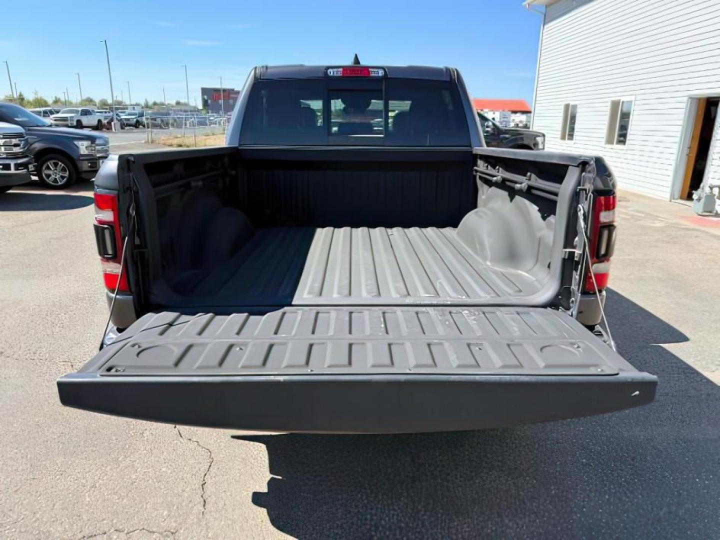 2022 GRAY /LEATHER Ram 1500 (1C6SRFLT3NN) with an 57 engine, Automatic transmission, located at 1175 N Woodruff Ave, Idaho Falls, ID, 83401, 43.506901, -111.999657 - At Timberline Auto, finding a great deal on your next vehicle is always easy! Our experienced sales staff's goal is to help find you the right vehicle at the right price! Our knowledgeable finance department has options for almost any credit score. We offer extended service contract options to prote - Photo#4