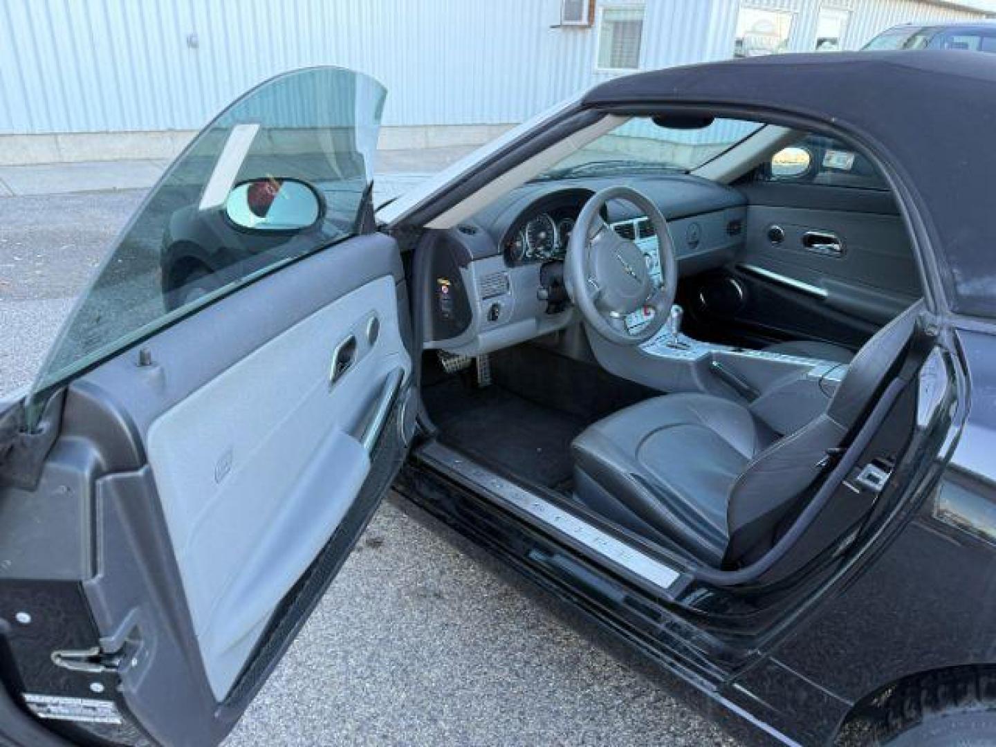 2005 BLACK /Dark Slate Gray Chrysler Crossfire (1C3AN65L35X) with an 32L V-6 premium unleaded engine, Automatic transmission, located at 1175 N Woodruff Ave, Idaho Falls, ID, 83401, 43.506901, -111.999657 - At Timberline Auto, finding a great deal on your next vehicle is always easy! Our experienced sales staff's goal is to help find you the right vehicle at the right price! Our knowledgeable finance department has options for almost any credit score. We offer extended service contract options to prote - Photo#26