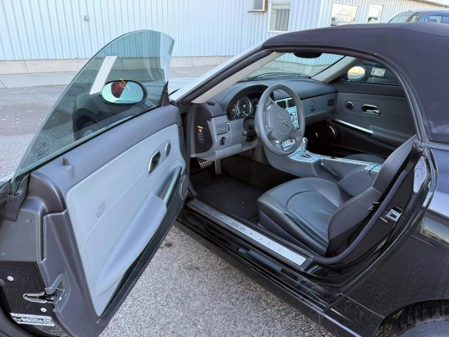 2005 BLACK /Dark Slate Gray Chrysler Crossfire (1C3AN65L35X) with an 32L V-6 premium unleaded engine, Automatic transmission, located at 1175 N Woodruff Ave, Idaho Falls, ID, 83401, 43.506901, -111.999657 - At Timberline Auto, finding a great deal on your next vehicle is always easy! Our experienced sales staff's goal is to help find you the right vehicle at the right price! Our knowledgeable finance department has options for almost any credit score. We offer extended service contract options to prote - Photo#9