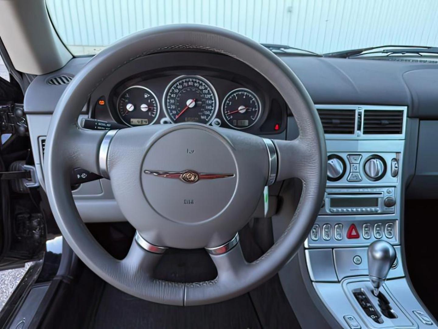 2005 BLACK /Dark Slate Gray Chrysler Crossfire (1C3AN65L35X) with an 32L V-6 premium unleaded engine, Automatic transmission, located at 1175 N Woodruff Ave, Idaho Falls, ID, 83401, 43.506901, -111.999657 - At Timberline Auto, finding a great deal on your next vehicle is always easy! Our experienced sales staff's goal is to help find you the right vehicle at the right price! Our knowledgeable finance department has options for almost any credit score. We offer extended service contract options to prote - Photo#12