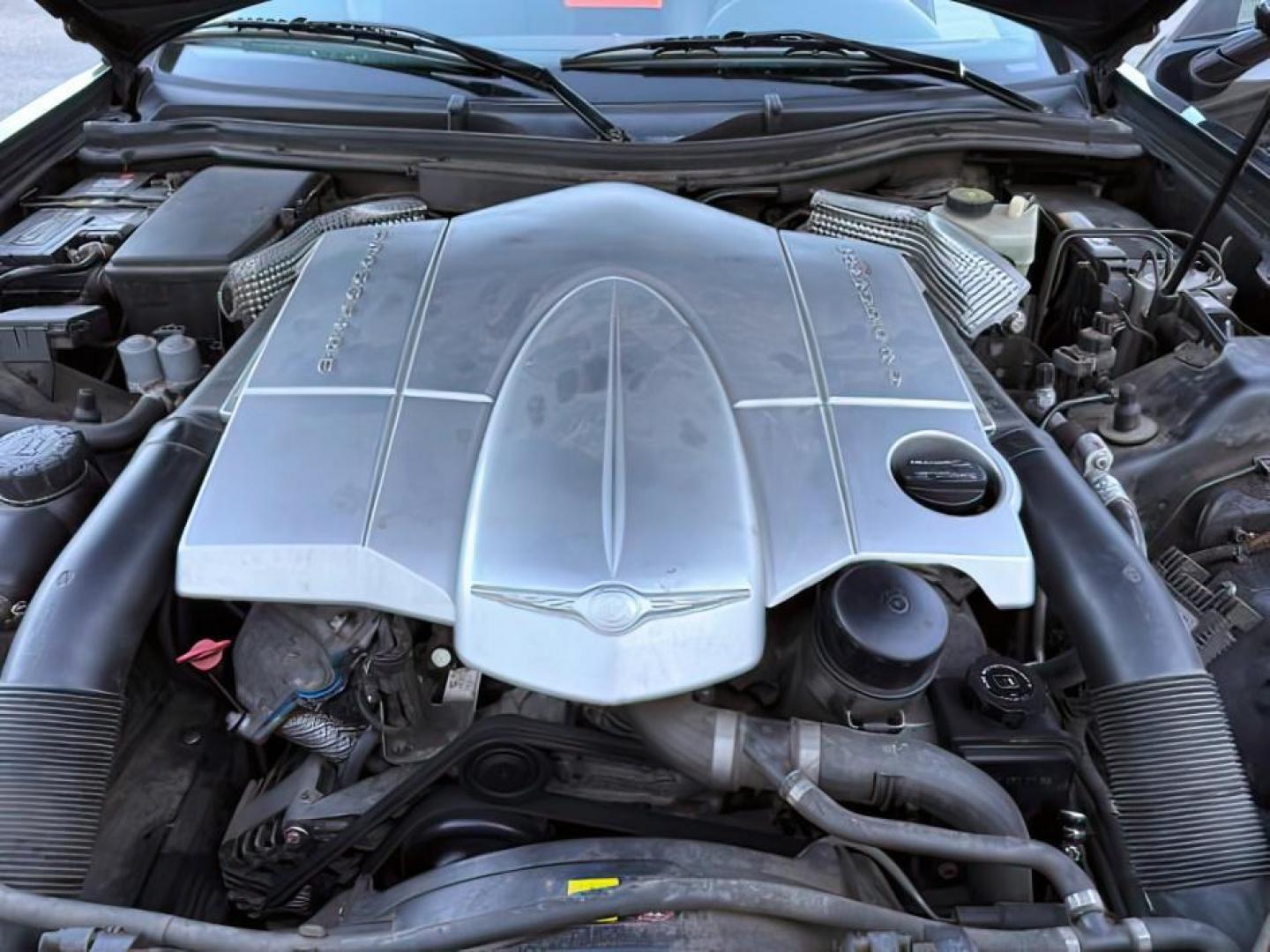 2005 BLACK /Dark Slate Gray Chrysler Crossfire (1C3AN65L35X) with an 32L V-6 premium unleaded engine, Automatic transmission, located at 1175 N Woodruff Ave, Idaho Falls, ID, 83401, 43.506901, -111.999657 - At Timberline Auto, finding a great deal on your next vehicle is always easy! Our experienced sales staff's goal is to help find you the right vehicle at the right price! Our knowledgeable finance department has options for almost any credit score. We offer extended service contract options to prote - Photo#16