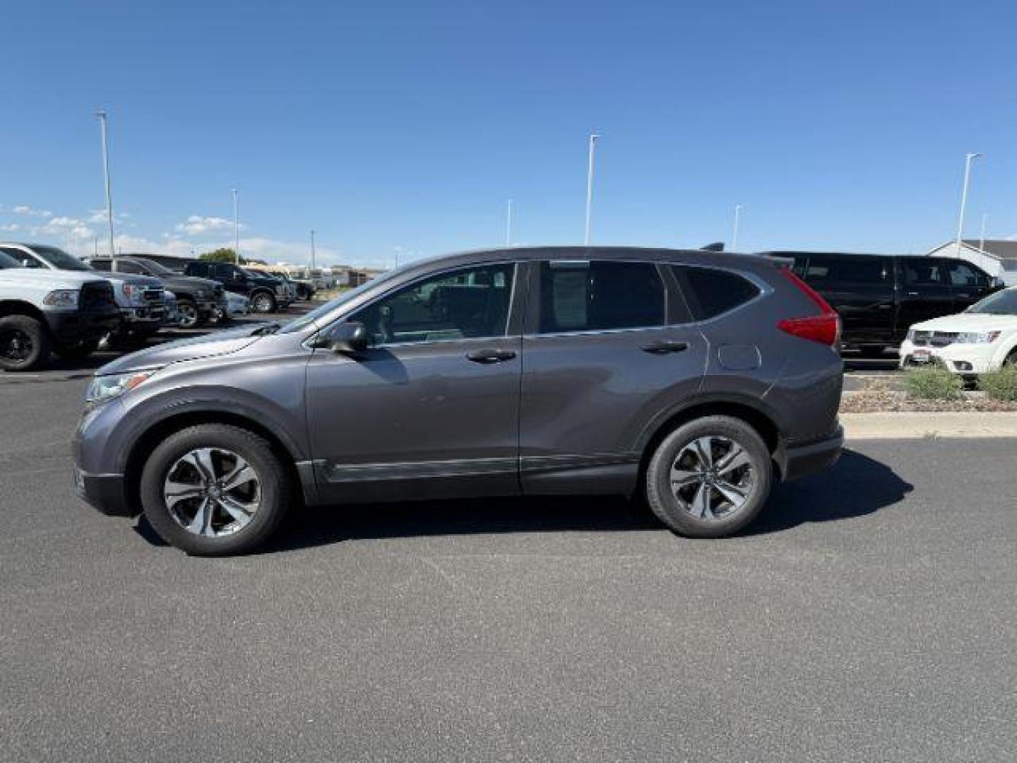2017 GRAY /Black Honda CR-V (2HKRW5H33HH) with an 24L I-4 gasoline direct injection engine, Automatic transmission, located at 1175 N Woodruff Ave, Idaho Falls, ID, 83401, 43.506901, -111.999657 - At Timberline Auto, finding a great deal on your next vehicle is always easy! Our experienced sales staff's goal is to help find you the right vehicle at the right price! Our knowledgeable finance department has options for almost any credit score. We offer extended service contract options to prote - Photo#1