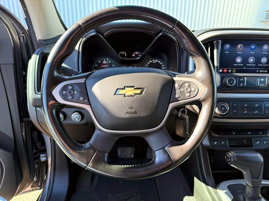 2021 GRAY /Jet Black Chevrolet Colorado 4WD Crew Cab Short Box LT (1GCGTCEN5M1) with an 3.6L V-6 gasoline direct injection engine, AUTOMATIC transmission, located at 1235 N Woodruff Ave., Idaho Falls, 83401, (208) 523-1053, 43.507172, -112.000488 - At Timberline Auto, finding a great deal on your next vehicle is always easy! Our experienced sales staff's goal is to help find you the right vehicle at the right price! Our knowledgeable finance department has options for almost any credit score. We offer extended service contract options to prote - Photo#13