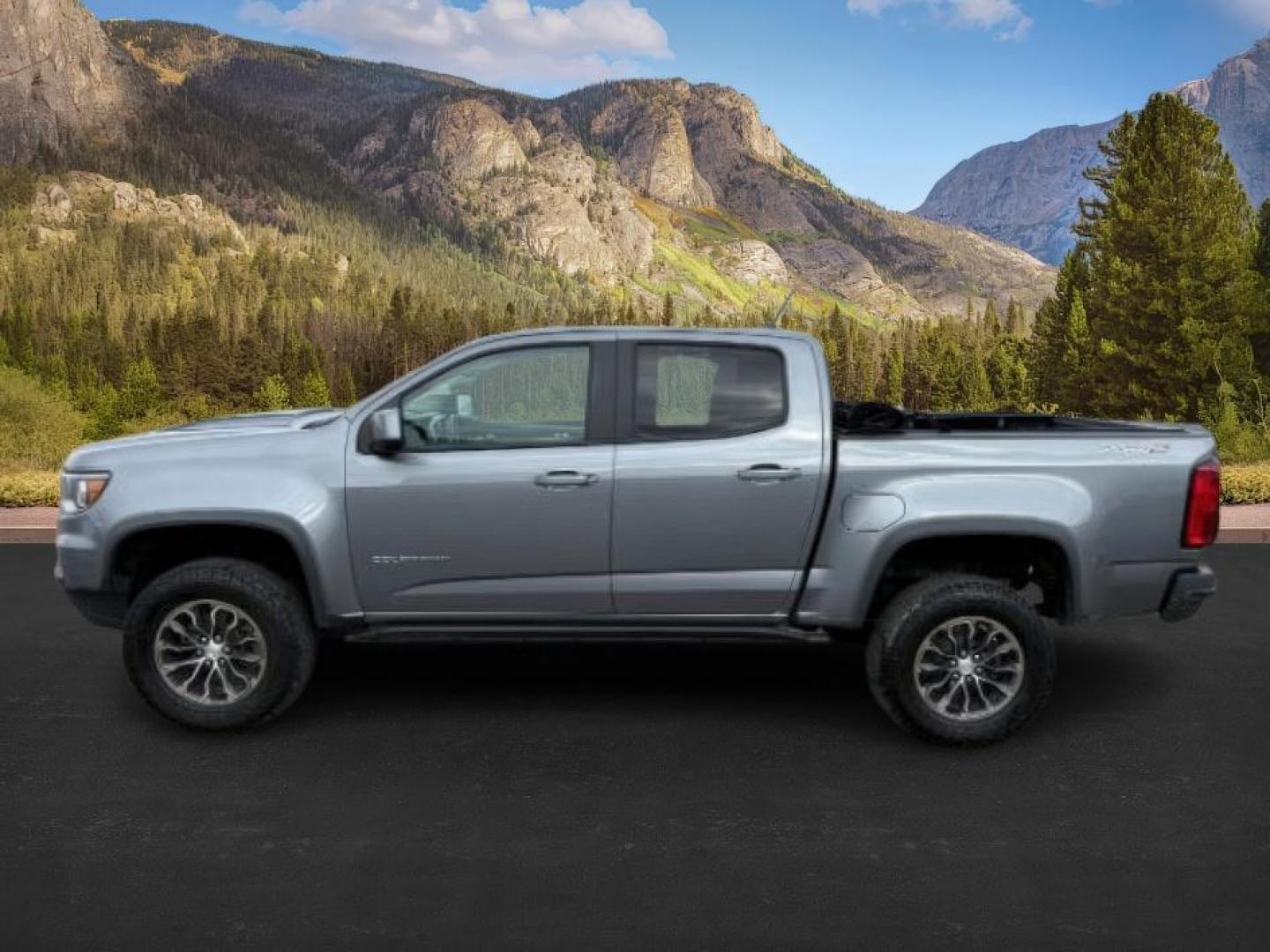 2021 GRAY /Jet Black Chevrolet Colorado (1GCGTEEN9M1) with an 36L V-6 gasoline direct injection engine, Automatic transmission, located at 1175 N Woodruff Ave, Idaho Falls, ID, 83401, 43.506901, -111.999657 - At Timberline Auto, finding a great deal on your next vehicle is always easy! Our experienced sales staff's goal is to help find you the right vehicle at the right price! Our knowledgeable finance department has options for almost any credit score. We offer extended service contract options to prote - Photo#1