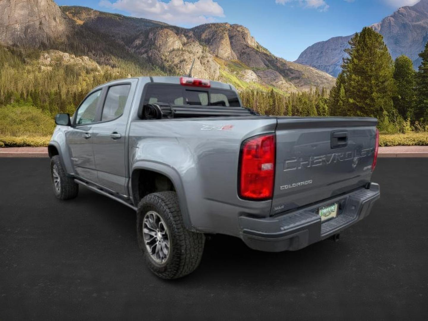 2021 GRAY /Jet Black Chevrolet Colorado (1GCGTEEN9M1) with an 36L V-6 gasoline direct injection engine, Automatic transmission, located at 1175 N Woodruff Ave, Idaho Falls, ID, 83401, 43.506901, -111.999657 - At Timberline Auto, finding a great deal on your next vehicle is always easy! Our experienced sales staff's goal is to help find you the right vehicle at the right price! Our knowledgeable finance department has options for almost any credit score. We offer extended service contract options to prote - Photo#2