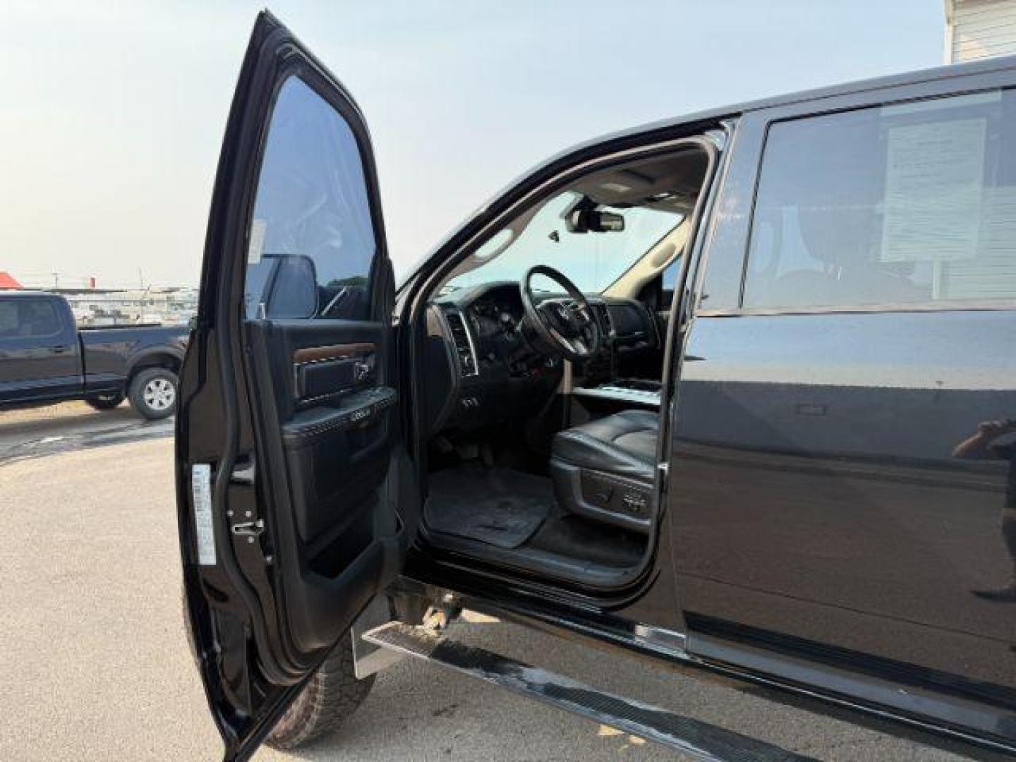 2015 Black Clearcoat /Black Ram 2500 (3C6UR5KL0FG) with an Cummins 67L I-6 diesel direct injection engine, Automatic transmission, located at 1175 N Woodruff Ave, Idaho Falls, ID, 83401, 43.506901, -111.999657 - At Timberline Auto, finding a great deal on your next vehicle is always easy! Our experienced sales staff's goal is to help find you the right vehicle at the right price! Our knowledgeable finance department has options for almost any credit score. We offer extended service contract options to prote - Photo#33