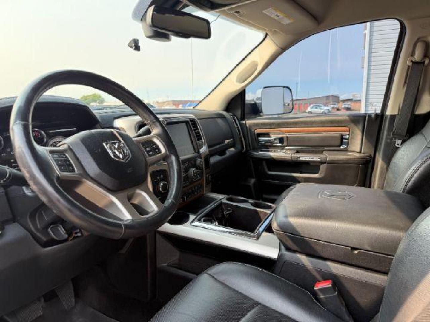 2015 Black Clearcoat /Black Ram 2500 (3C6UR5KL0FG) with an Cummins 67L I-6 diesel direct injection engine, Automatic transmission, located at 1175 N Woodruff Ave, Idaho Falls, ID, 83401, 43.506901, -111.999657 - At Timberline Auto, finding a great deal on your next vehicle is always easy! Our experienced sales staff's goal is to help find you the right vehicle at the right price! Our knowledgeable finance department has options for almost any credit score. We offer extended service contract options to prote - Photo#35