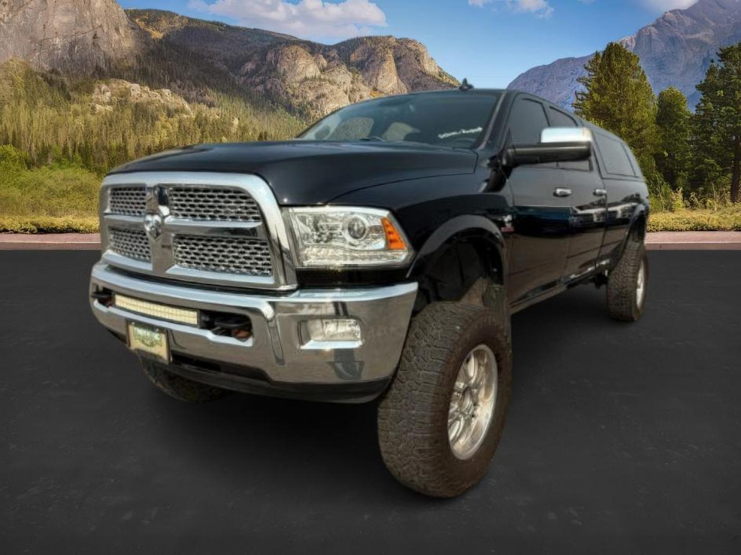 2015 Black Clearcoat /Black Ram 2500 (3C6UR5KL0FG) with an Cummins 67L I-6 diesel direct injection engine, Automatic transmission, located at 1175 N Woodruff Ave, Idaho Falls, ID, 83401, 43.506901, -111.999657 - At Timberline Auto, finding a great deal on your next vehicle is always easy! Our experienced sales staff's goal is to help find you the right vehicle at the right price! Our knowledgeable finance department has options for almost any credit score. We offer extended service contract options to prote - Photo#0