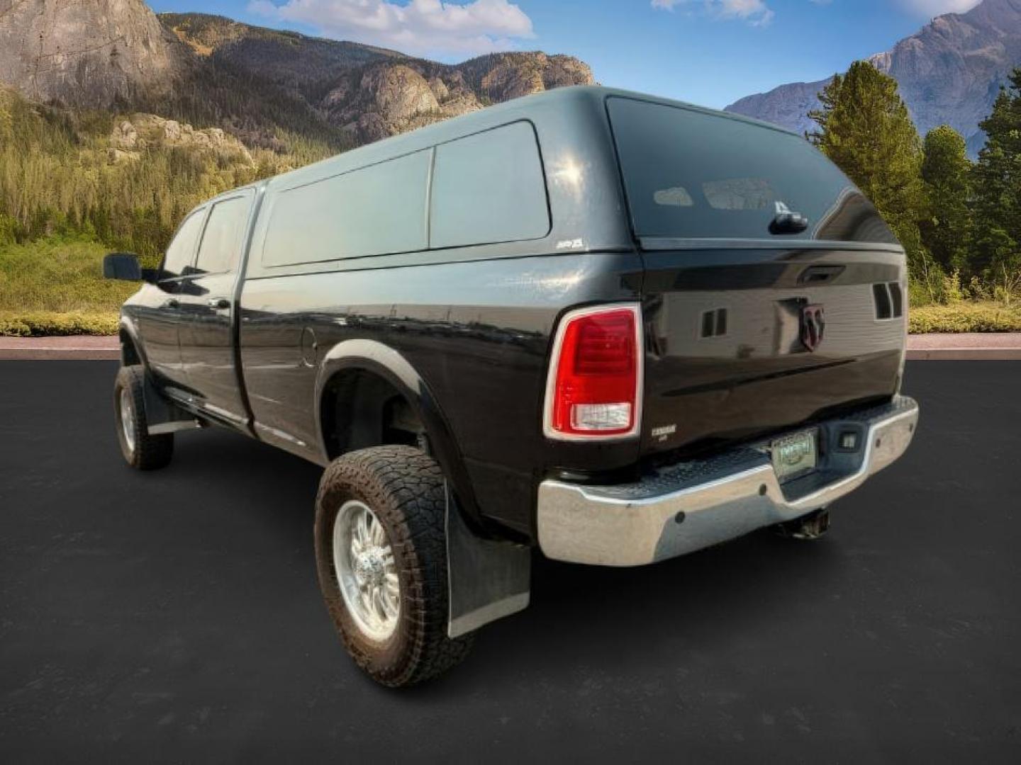 2015 Black Clearcoat /Black Ram 2500 (3C6UR5KL0FG) with an Cummins 67L I-6 diesel direct injection engine, Automatic transmission, located at 1175 N Woodruff Ave, Idaho Falls, ID, 83401, 43.506901, -111.999657 - At Timberline Auto, finding a great deal on your next vehicle is always easy! Our experienced sales staff's goal is to help find you the right vehicle at the right price! Our knowledgeable finance department has options for almost any credit score. We offer extended service contract options to prote - Photo#2