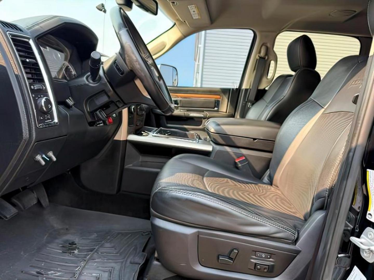 2015 Black Clearcoat /Black Ram 2500 (3C6UR5KL0FG) with an Cummins 67L I-6 diesel direct injection engine, Automatic transmission, located at 1175 N Woodruff Ave, Idaho Falls, ID, 83401, 43.506901, -111.999657 - At Timberline Auto, finding a great deal on your next vehicle is always easy! Our experienced sales staff's goal is to help find you the right vehicle at the right price! Our knowledgeable finance department has options for almost any credit score. We offer extended service contract options to prote - Photo#11
