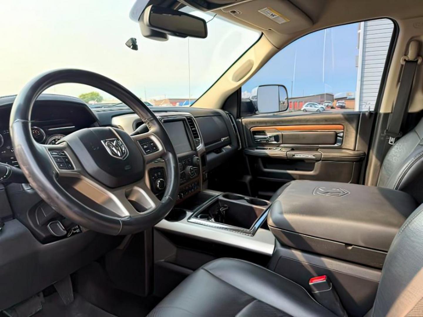 2015 Black Clearcoat /Black Ram 2500 (3C6UR5KL0FG) with an Cummins 67L I-6 diesel direct injection engine, Automatic transmission, located at 1175 N Woodruff Ave, Idaho Falls, ID, 83401, 43.506901, -111.999657 - At Timberline Auto, finding a great deal on your next vehicle is always easy! Our experienced sales staff's goal is to help find you the right vehicle at the right price! Our knowledgeable finance department has options for almost any credit score. We offer extended service contract options to prote - Photo#12