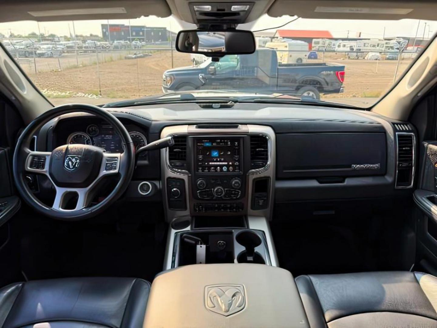 2015 Black Clearcoat /Black Ram 2500 (3C6UR5KL0FG) with an Cummins 67L I-6 diesel direct injection engine, Automatic transmission, located at 1175 N Woodruff Ave, Idaho Falls, ID, 83401, 43.506901, -111.999657 - At Timberline Auto, finding a great deal on your next vehicle is always easy! Our experienced sales staff's goal is to help find you the right vehicle at the right price! Our knowledgeable finance department has options for almost any credit score. We offer extended service contract options to prote - Photo#18