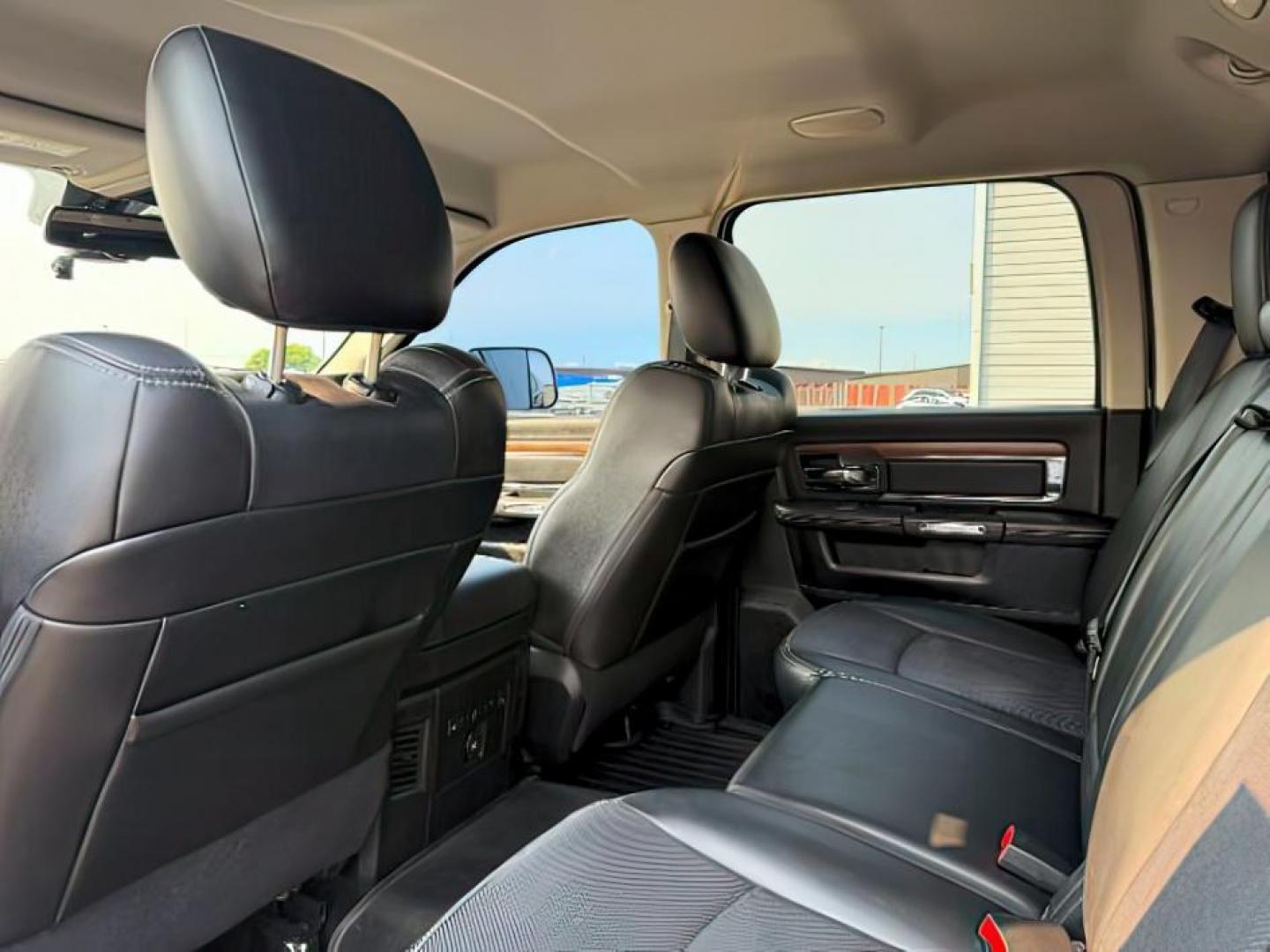 2015 Black Clearcoat /Black Ram 2500 (3C6UR5KL0FG) with an Cummins 67L I-6 diesel direct injection engine, Automatic transmission, located at 1175 N Woodruff Ave, Idaho Falls, ID, 83401, 43.506901, -111.999657 - At Timberline Auto, finding a great deal on your next vehicle is always easy! Our experienced sales staff's goal is to help find you the right vehicle at the right price! Our knowledgeable finance department has options for almost any credit score. We offer extended service contract options to prote - Photo#22