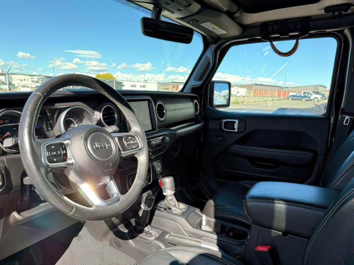 2019 BLACK /CLOTH Jeep Wrangler Unlimited (1C4HJXEN6KW) with an 20 TURBO engine, Automatic transmission, located at 1175 N Woodruff Ave, Idaho Falls, ID, 83401, 43.506901, -111.999657 - At Timberline Auto, finding a great deal on your next vehicle is always easy! Our experienced sales staff's goal is to help find you the right vehicle at the right price! Our knowledgeable finance department has options for almost any credit score. We offer extended service contract options to prote - Photo#13