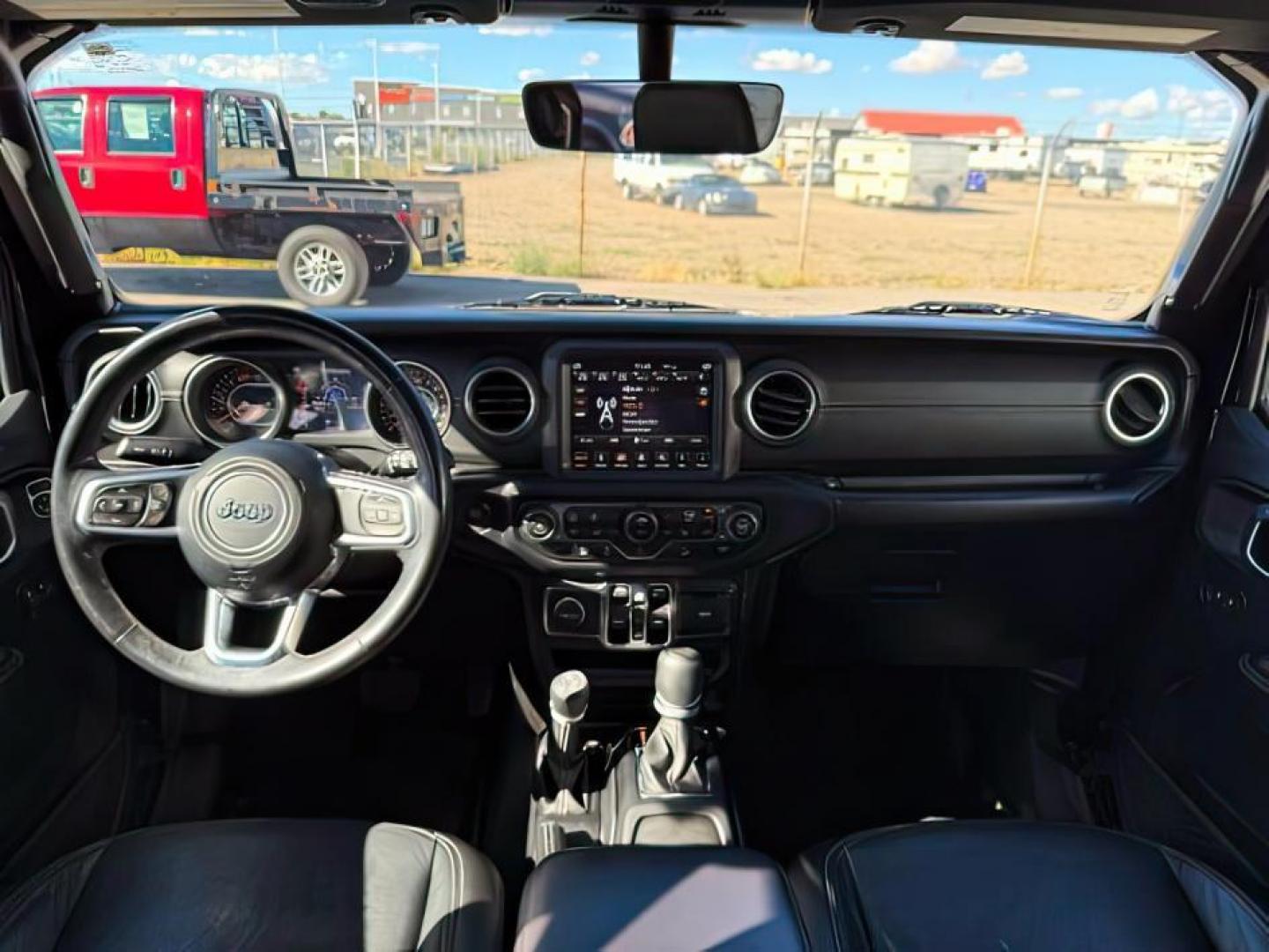2019 BLACK /CLOTH Jeep Wrangler Unlimited (1C4HJXEN6KW) with an 20 TURBO engine, Automatic transmission, located at 1175 N Woodruff Ave, Idaho Falls, ID, 83401, 43.506901, -111.999657 - At Timberline Auto, finding a great deal on your next vehicle is always easy! Our experienced sales staff's goal is to help find you the right vehicle at the right price! Our knowledgeable finance department has options for almost any credit score. We offer extended service contract options to prote - Photo#19