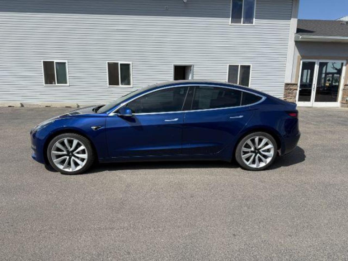 2018 BLUE /CLOTH Tesla Model 3 (5YJ3E1EA4JF) with an ELECTRIC engine, Automatic transmission, located at 1175 N Woodruff Ave, Idaho Falls, ID, 83401, 43.506901, -111.999657 - At Timberline Auto, finding a great deal on your next vehicle is always easy! Our experienced sales staff's goal is to help find you the right vehicle at the right price! Our knowledgeable finance department has options for almost any credit score. We offer extended service contract options to prote - Photo#19