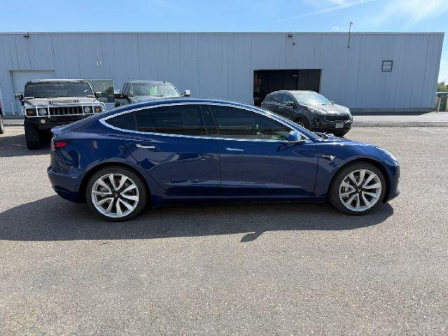 2018 BLUE /CLOTH Tesla Model 3 (5YJ3E1EA4JF) with an ELECTRIC engine, Automatic transmission, located at 1175 N Woodruff Ave, Idaho Falls, ID, 83401, 43.506901, -111.999657 - At Timberline Auto, finding a great deal on your next vehicle is always easy! Our experienced sales staff's goal is to help find you the right vehicle at the right price! Our knowledgeable finance department has options for almost any credit score. We offer extended service contract options to prote - Photo#23