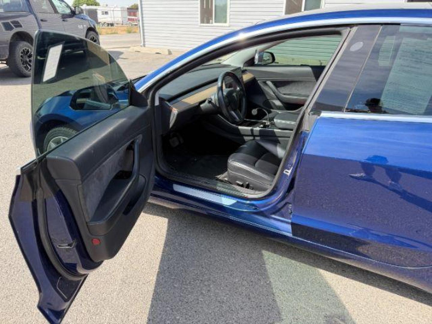 2018 BLUE /CLOTH Tesla Model 3 (5YJ3E1EA4JF) with an ELECTRIC engine, Automatic transmission, located at 1175 N Woodruff Ave, Idaho Falls, ID, 83401, 43.506901, -111.999657 - At Timberline Auto, finding a great deal on your next vehicle is always easy! Our experienced sales staff's goal is to help find you the right vehicle at the right price! Our knowledgeable finance department has options for almost any credit score. We offer extended service contract options to prote - Photo#27