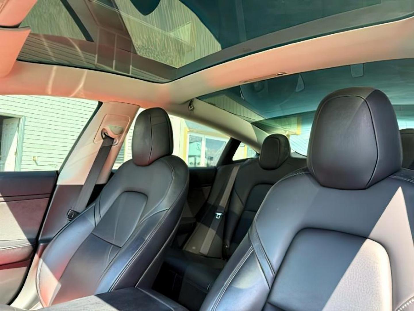 2018 BLUE /CLOTH Tesla Model 3 (5YJ3E1EA4JF) with an ELECTRIC engine, Automatic transmission, located at 1175 N Woodruff Ave, Idaho Falls, ID, 83401, 43.506901, -111.999657 - At Timberline Auto, finding a great deal on your next vehicle is always easy! Our experienced sales staff's goal is to help find you the right vehicle at the right price! Our knowledgeable finance department has options for almost any credit score. We offer extended service contract options to prote - Photo#14